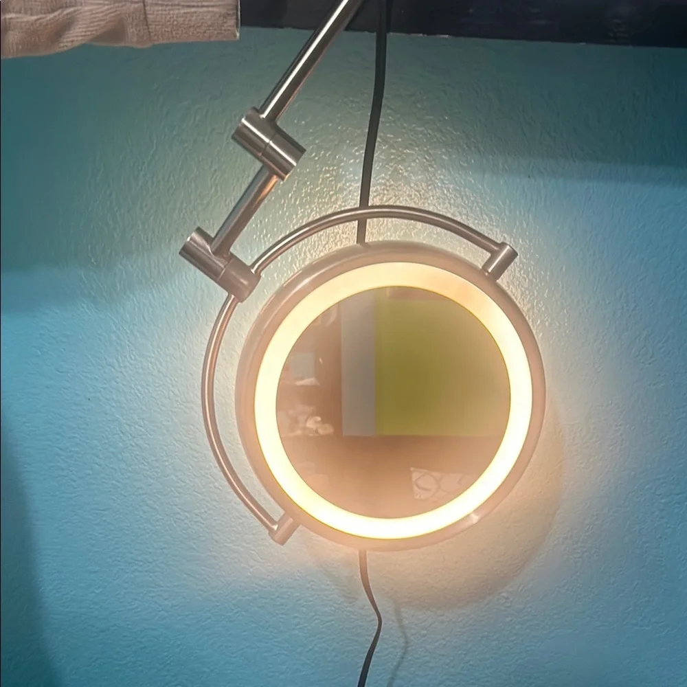 Wall-Mounted Mirror with Built-In Light